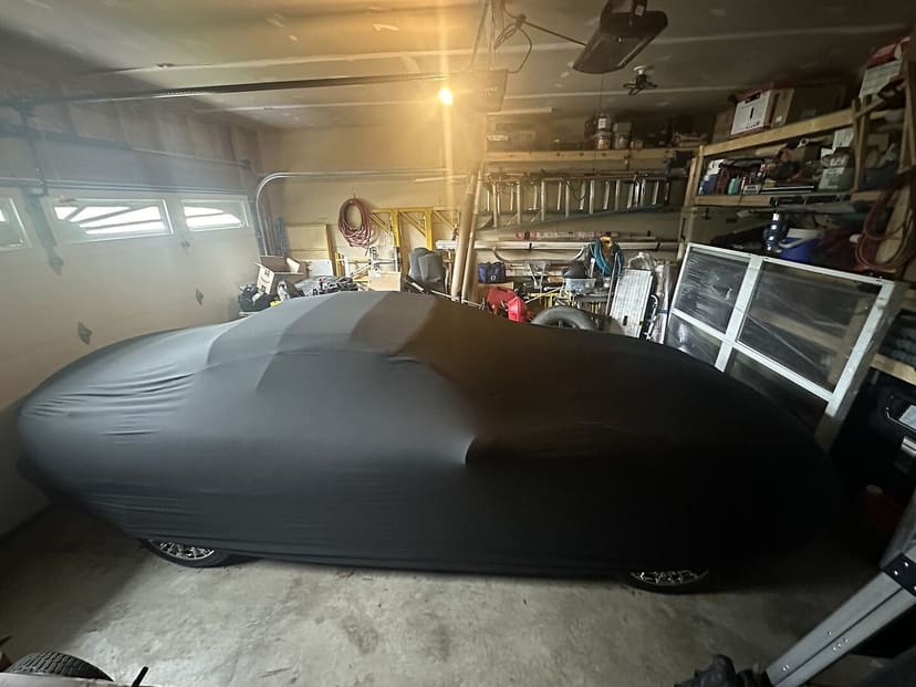Jamie K.'s car under its Satin Protect cover