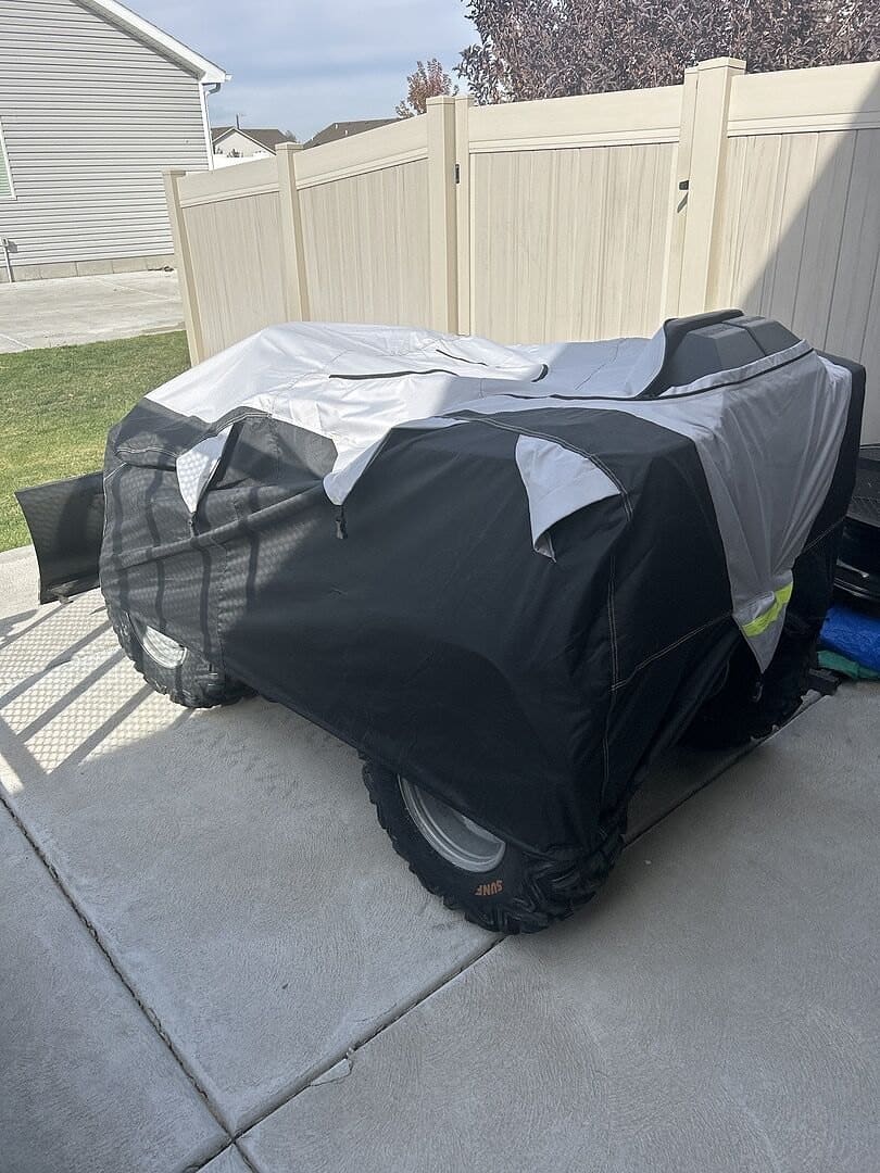 Joe L.'s vehicle under its cover, from their review.