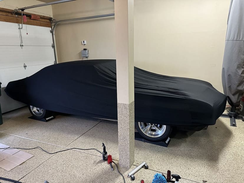 Aaron E.'s car under its Satin Protect cover