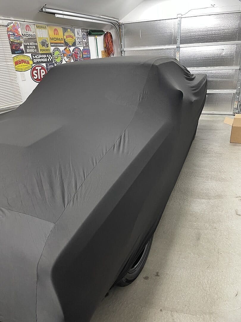 Andrew W.'s vehicle under its cover, from their review.