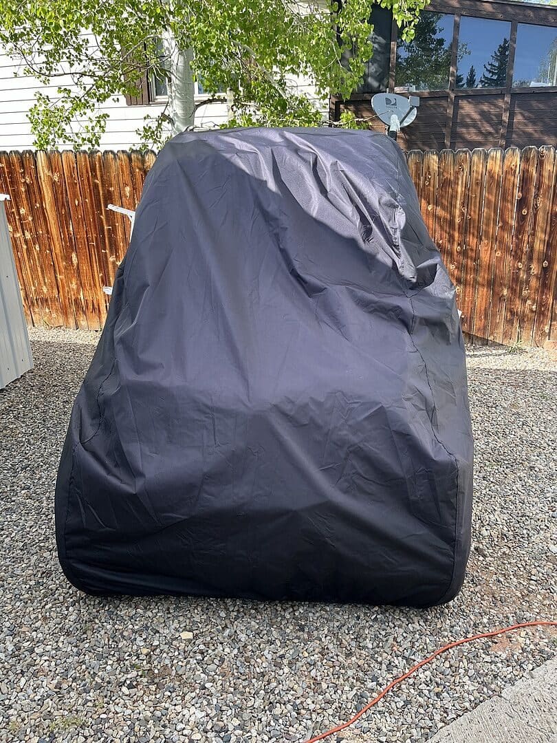 Jonathon N.'s vehicle under its cover, from their review.