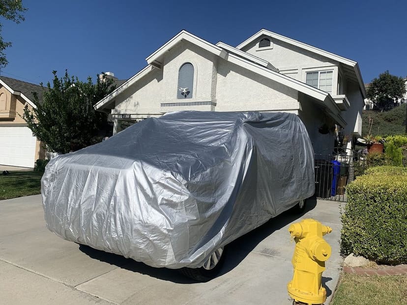 Dominick M.'s vehicle under its cover, from their review.