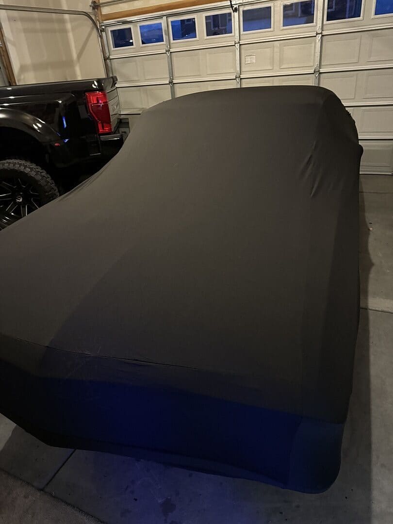 Jeremiah A.'s car under its Satin Protect cover