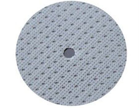 A round grey fabric patch with a small hole in the middle.