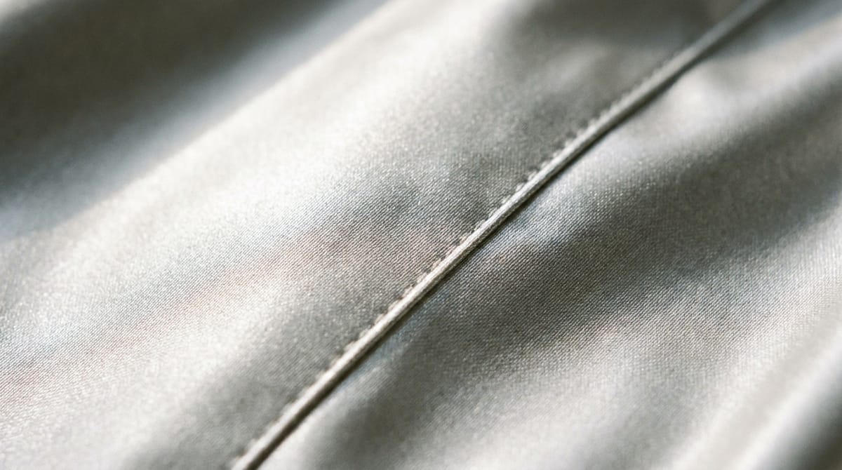 Close-up of the cover fabric along a sewn seam