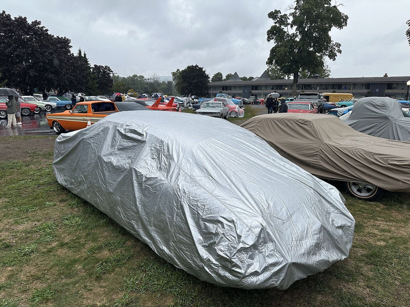 A customer's car under its CarCovers cover