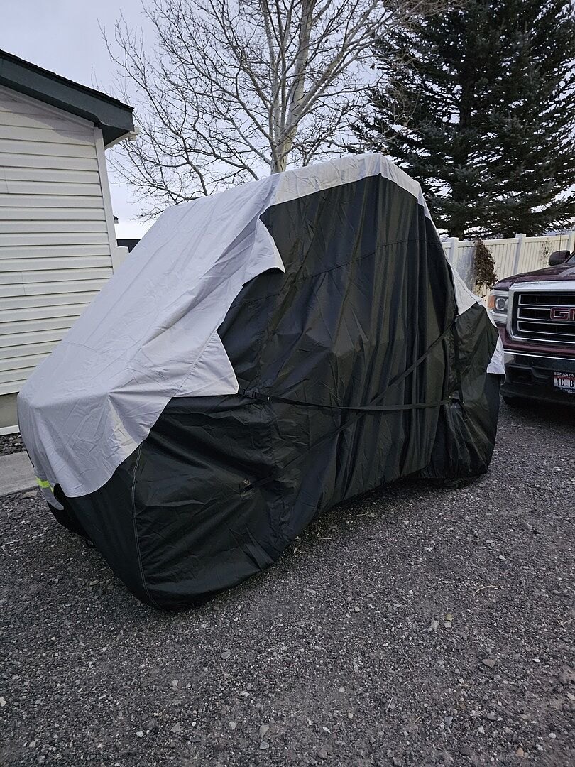 A customer's powersports machine under its CarCovers cover
