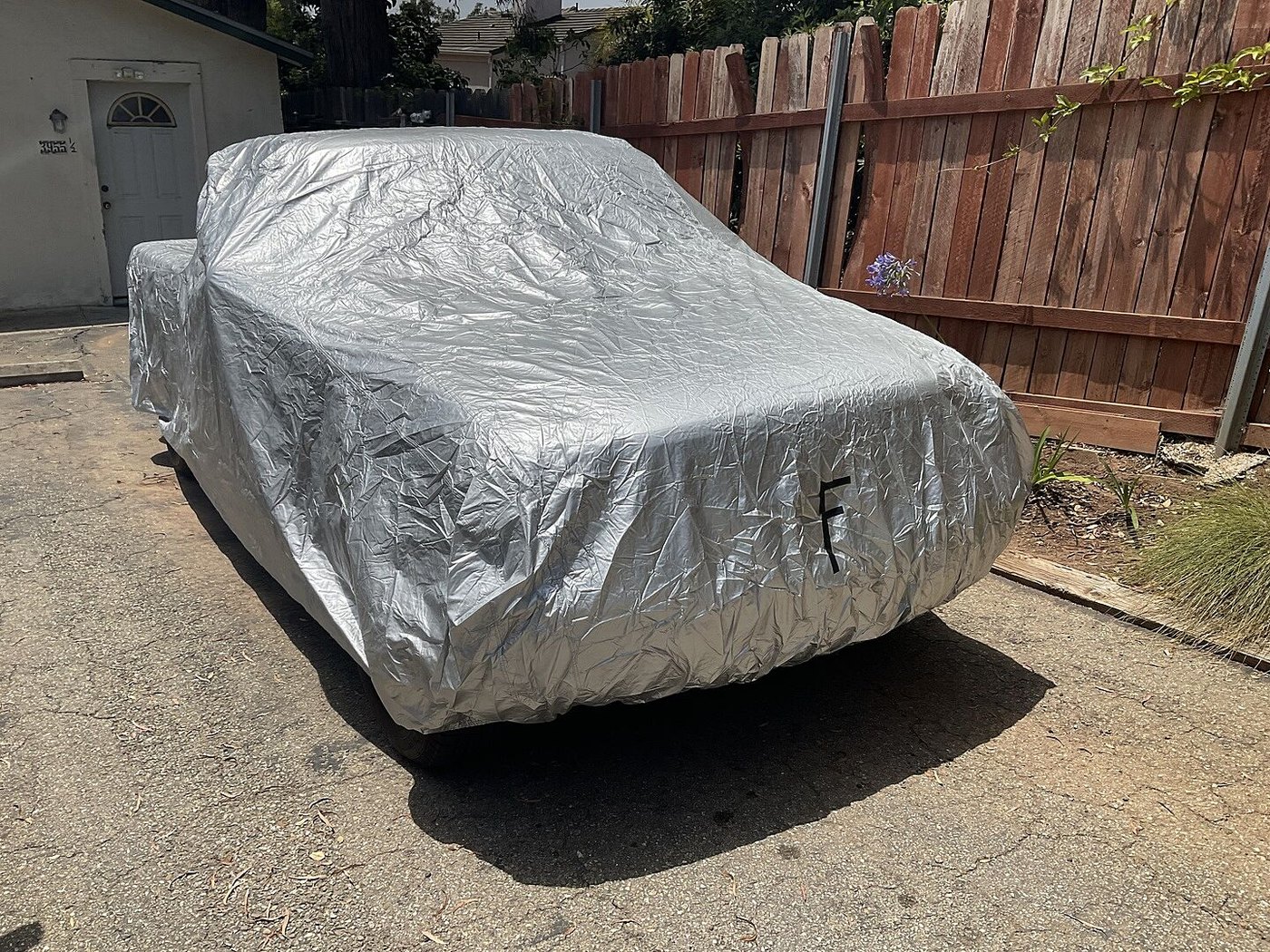 CarCovers customer photo: John T.'s vehicle under its cover